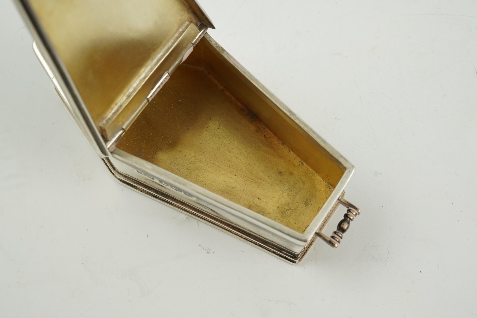 A George VI novelty silver snuff box, modelled as coffin with two handles and an 'RIP' appliqué, maker HW